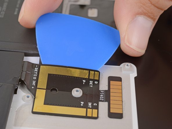 Microsoft Surface Pro 5 Battery Replacement, Separate the battery connector adhesive: crwdns2935265:051crwdnd2935265:02crwdnd2935265:03crwdne2935265:0