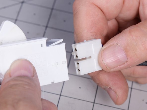 LG Refrigerator LFX25973 Freezer Drawer Switch Testing and Replacement, Disconnect the wiring harness from the drawer switch: crwdns2935265:015crwdnd2935265:02crwdnd2935265:02crwdne2935265:0