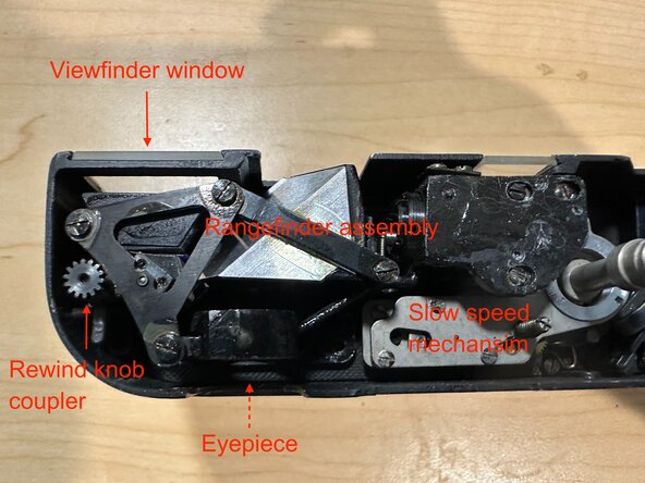 Cleaning & lubricating a GOMZ Leningrad, Remove the shutter button and flash port: crwdns2935265:03crwdnd2935265:02crwdnd2935265:03crwdne2935265:0
