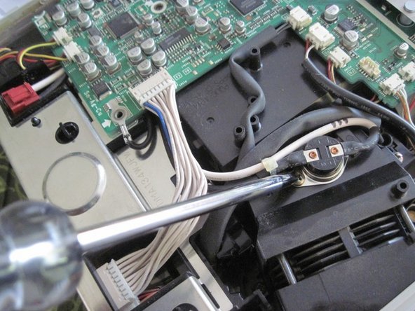 Sharp PG-A10X Thermal Fuse Replacement, Remove the thermal fuse (1): crwdns2935265:08crwdnd2935265:02crwdnd2935265:03crwdne2935265:0