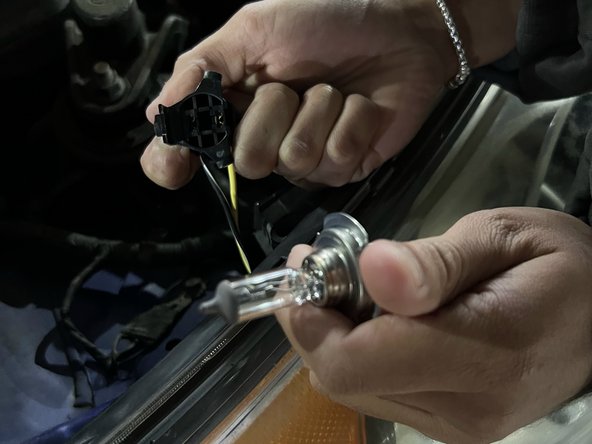 2014 Hyundai Veloster Headlight Replacement: step 5, image 3 of 3