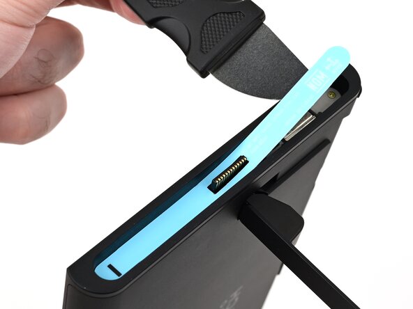 Nintendo Switch 2 Microphone Replacement, Remove the left side sticker: crwdns2935265:09crwdnd2935265:02crwdnd2935265:03crwdne2935265:0