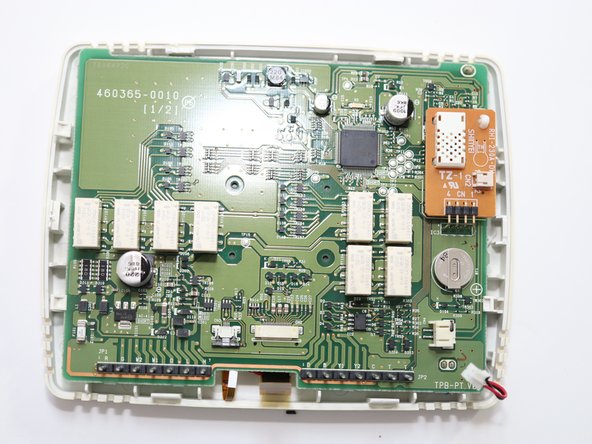 Lennox Y0349 Thermostat Teardown, Removing the Board and Display: crwdns2935265:04crwdnd2935265:03crwdnd2935265:03crwdne2935265:0