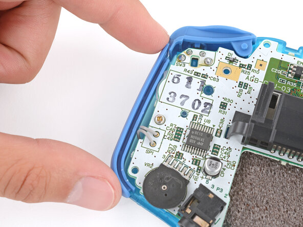 How to Reshell Your Game Boy Advance, Install the side bumpers: crwdns2935265:032crwdnd2935265:03crwdnd2935265:03crwdne2935265:0