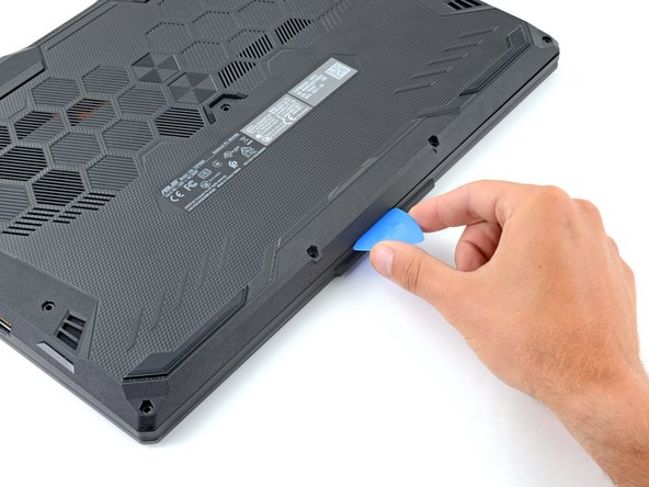 ASUS TUF Gaming F15 FX506HEB-DB74 Left SSD Replacement, Release the remaining clips: crwdns2935265:04crwdnd2935265:02crwdnd2935265:03crwdne2935265:0