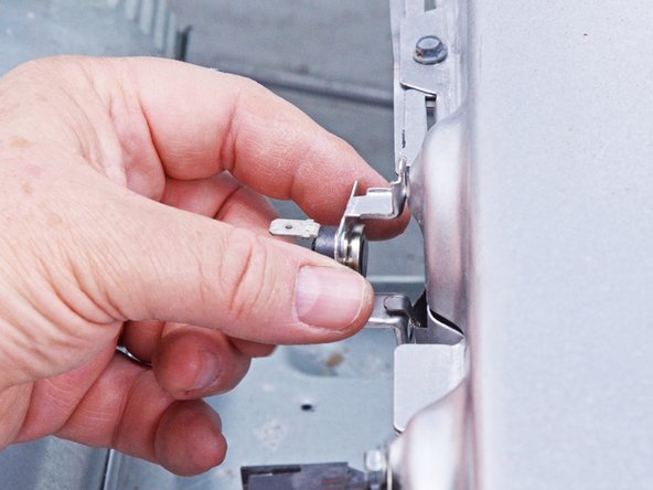 Whirlpool WED87HED Dryer Heating Element Testing and Replacement, Unfasten the thermal cutoff switch: crwdns2935265:052crwdnd2935265:02crwdnd2935265:03crwdne2935265:0