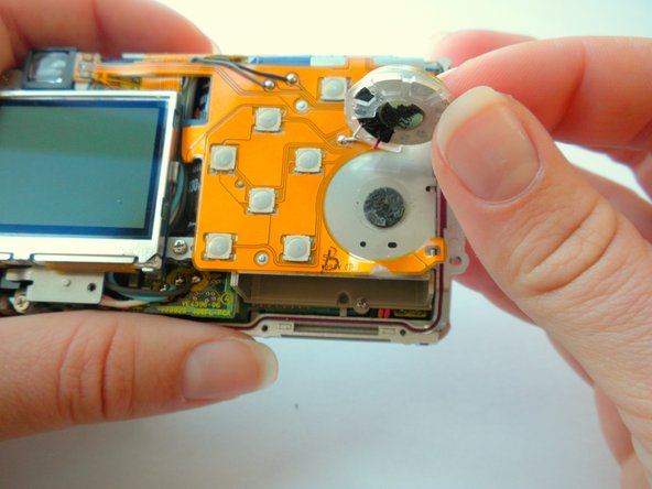 Olympus Stylus 410 Speaker Replacement, Speaker: crwdns2935265:08crwdnd2935265:03crwdnd2935265:03crwdne2935265:0