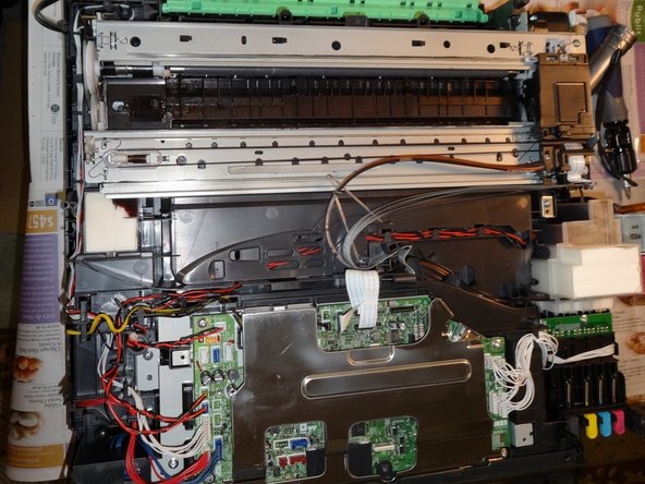 How to Unclog Brother Inkjet Print head Nozzles, Remove the Red conectors for the battery and speaker: crwdns2935265:09crwdnd2935265:02crwdnd2935265:02crwdne2935265:0