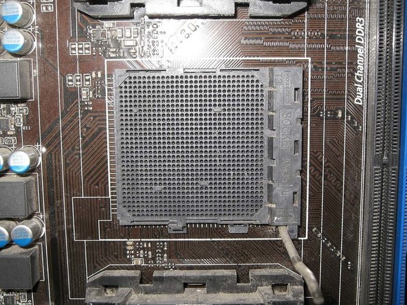 AMD AM3+ Desktop Processor Replacement and AMD 125W Cooler cleaning., Remove the the old Processor.: step 7, image 2 of 3