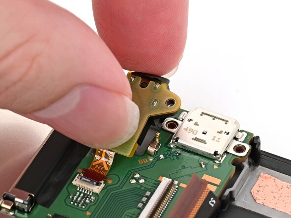 Nintendo Switch 2 Board Replacement, Install the headphone jack: crwdns2935265:071crwdnd2935265:02crwdnd2935265:03crwdne2935265:0