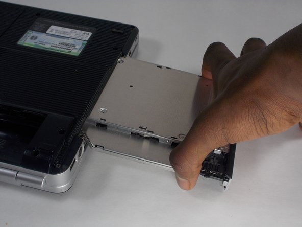 Compaq Presario V2414NR Optical Drive Replacement: crwdns2935265:04crwdnd2935265:03crwdnd2935265:03crwdne2935265:0