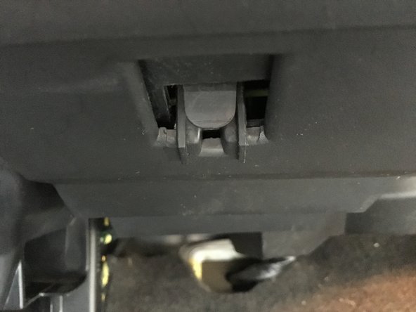 2000-2007 Chevrolet Monte Carlo Glove Compartment Door Removal, Passenger Side Kick Panel (Continued): crwdns2935265:00crwdnd2935265:01crwdnd2935265:03crwdne2935265:0