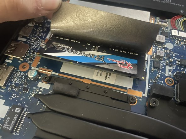 Lenovo IdeaPad Gaming 3 15ARH-334 RAM Replacement, Removing the old RAM: crwdns2935265:04crwdnd2935265:02crwdnd2935265:02crwdne2935265:0
