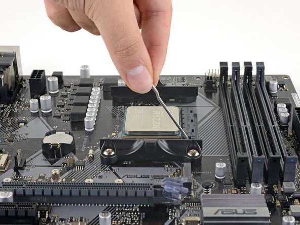 How to Fix Bent CPU Pins, Open and close the locking tab: crwdns2935265:011crwdnd2935265:02crwdnd2935265:03crwdne2935265:0