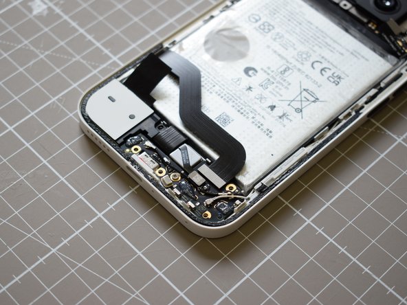 Nothing Phone (2a) Battery Replacement, Reconnect the flex cable on top leading to the sub board: crwdns2935265:022crwdnd2935265:03crwdnd2935265:03crwdne2935265:0