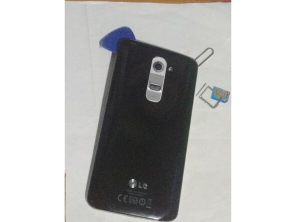 LG G2 Charging Port Replacement, Removing the rear cover: crwdns2935265:01crwdnd2935265:02crwdnd2935265:03crwdne2935265:0