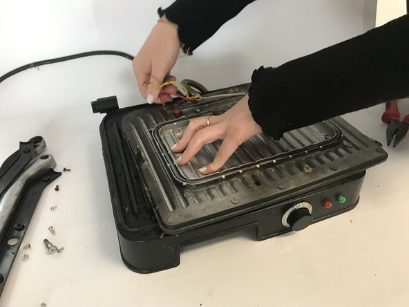 Panini Iron Teardown, Upper heating plate: crwdns2935265:04crwdnd2935265:02crwdnd2935265:03crwdne2935265:0