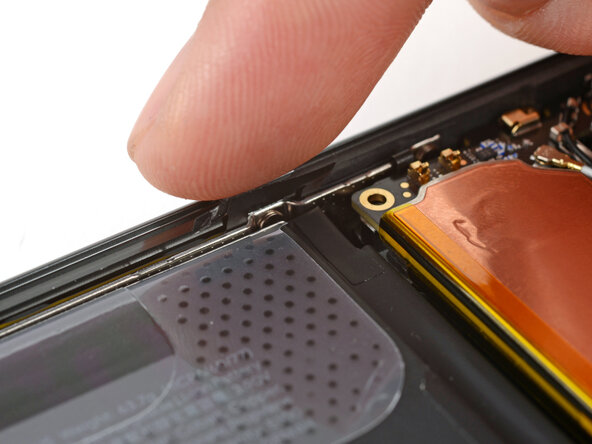Google Pixel 10a Battery Replacement, Fold the left button cable down: step 29, image 1 of 2