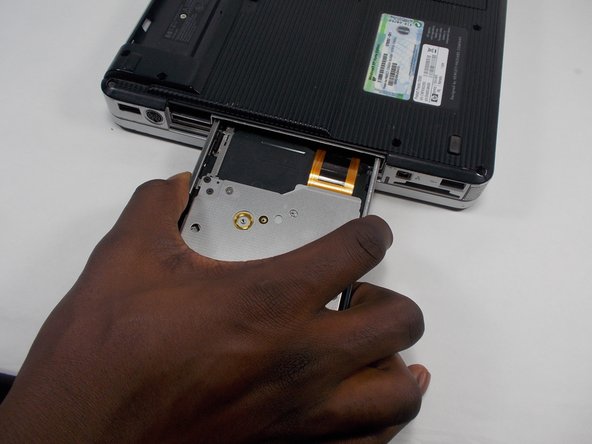 Compaq Presario V2414NR Optical Drive Replacement: crwdns2935265:04crwdnd2935265:02crwdnd2935265:03crwdne2935265:0