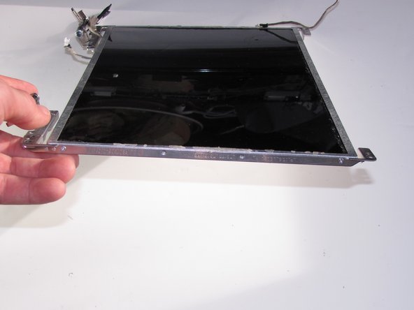 Disconnect the display LED cable from the display panel cable and remove the display panel.