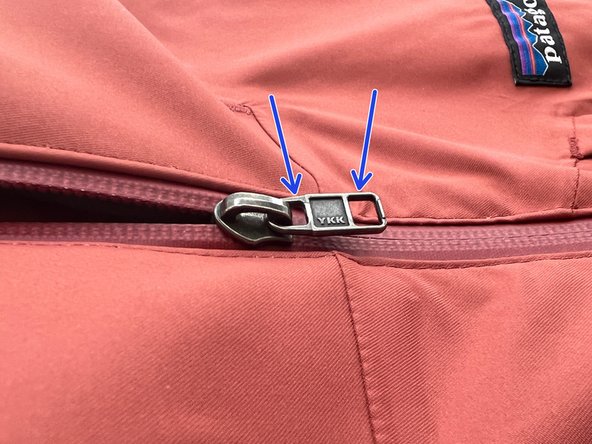 Zipper Pull Replacement, Locate the zipper tab: crwdns2935265:01crwdnd2935265:03crwdnd2935265:03crwdne2935265:0