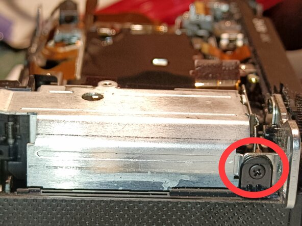 Teardown Sony ZV-E10 to reach SD card slot, Battery compartment screws: step 8, image 3 of 3