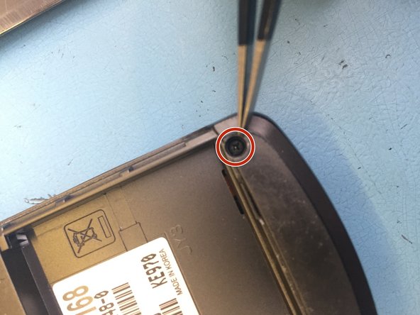 LG KE970 Teardown, Remove rubber screw covers: crwdns2935265:03crwdnd2935265:03crwdnd2935265:03crwdne2935265:0