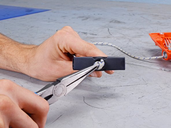 Echo Chain Saw CS590 2019 Starter Assembly Replacement, Remove the starter grip: crwdns2935265:017crwdnd2935265:02crwdnd2935265:03crwdne2935265:0