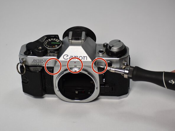 Repairing a Damaged Lens Mount on a Canon AE-1 Program - iFixit