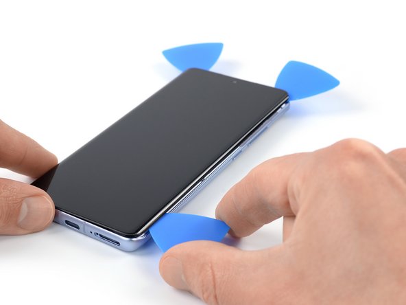 Xiaomi 12 Screen Replacement, Slice the right edge adhesive: crwdns2935265:027crwdnd2935265:03crwdnd2935265:03crwdne2935265:0