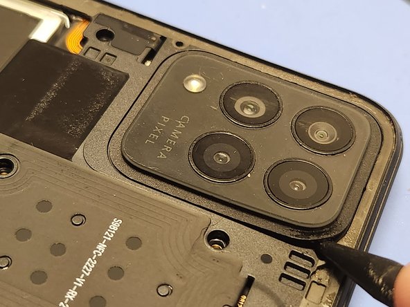 Revvl 6 Pro 5G Screen Replacement, Remove the Camera Lens: crwdns2935265:09crwdnd2935265:02crwdnd2935265:03crwdne2935265:0