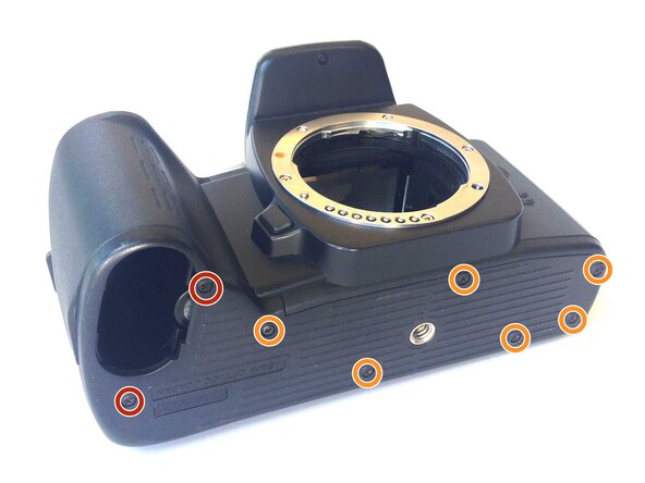 Pentax PZ-10 Back Cover Locking Switch Spring Replacement, Removing the Bottom Cover: crwdns2935265:01crwdnd2935265:01crwdnd2935265:01crwdne2935265:0