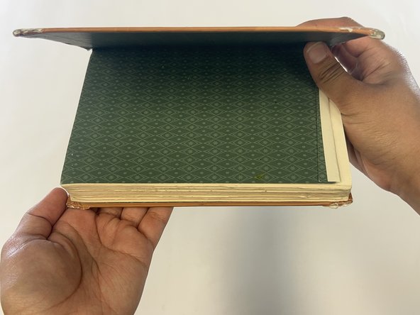 How to Repair Bumped Corners on a Hardcover Book: step 6, image 2 of 2