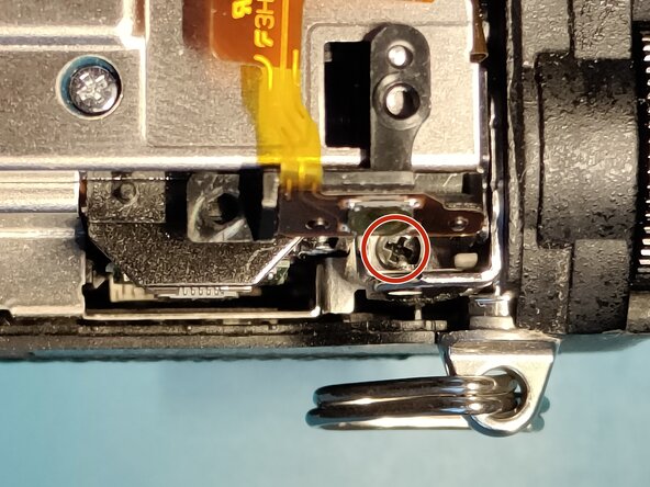 Sony A7 II Top Flex Cable replacement, Removing metal bracket 1: crwdns2935265:014crwdnd2935265:02crwdnd2935265:03crwdne2935265:0