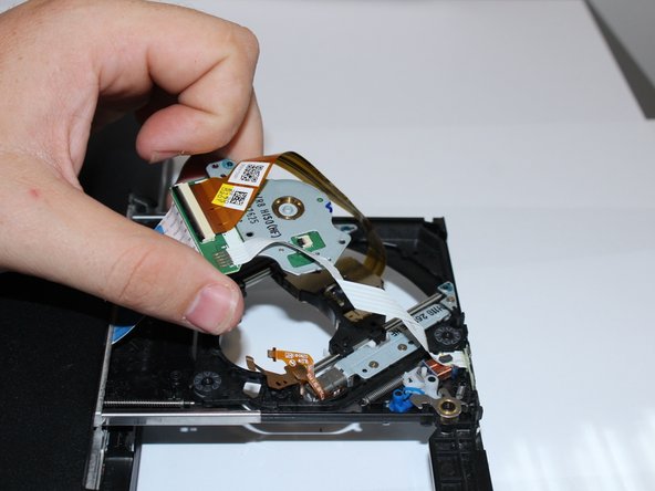 Asus G75VW-BHI7N07 Optical Drive Assembly Replacement: crwdns2935265:03crwdnd2935265:02crwdnd2935265:02crwdne2935265:0