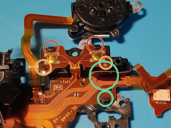 Sony A7 II Top Flex Cable replacement, Inserting it back into the plastic frame: crwdns2935265:036crwdnd2935265:01crwdnd2935265:03crwdne2935265:0