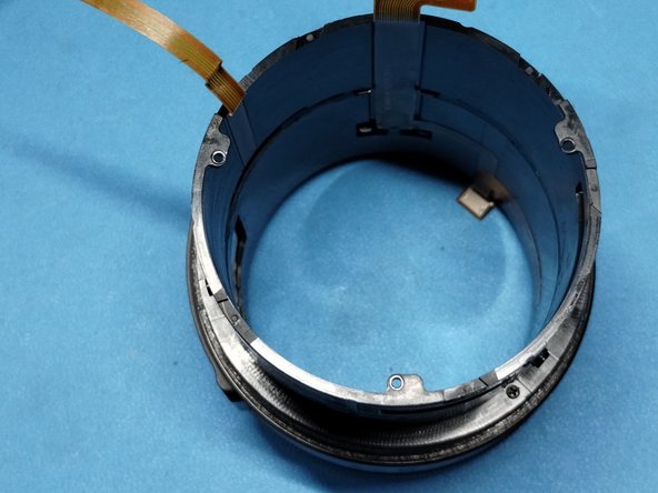 Samsung NX 50-150 f/2.8 S Lens - Focus Cable Repair, iFn Sleeve removal: crwdns2935265:017crwdnd2935265:03crwdnd2935265:03crwdne2935265:0