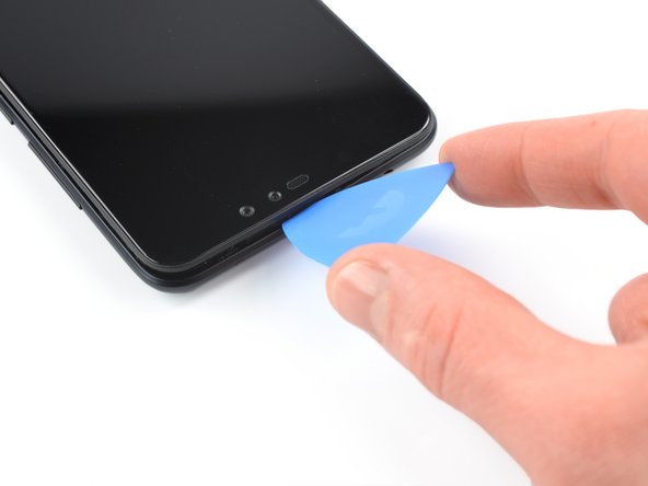 Xiaomi Redmi Note 6 Pro Battery Replacement, Release the remaining plastic clips: crwdns2935265:06crwdnd2935265:02crwdnd2935265:03crwdne2935265:0