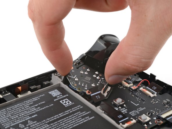 Steam Deck OLED Left Thumbstick Replacement, Remove the left thumbstick: crwdns2935265:013crwdnd2935265:02crwdnd2935265:03crwdne2935265:0
