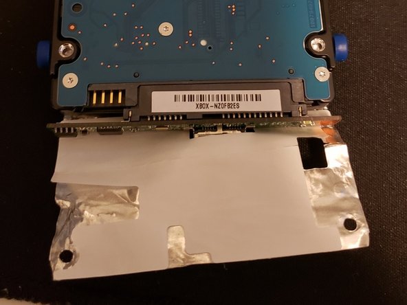 Game Drive for Xbox Teardown, Remove the Shielding: crwdns2935265:03crwdnd2935265:02crwdnd2935265:02crwdne2935265:0