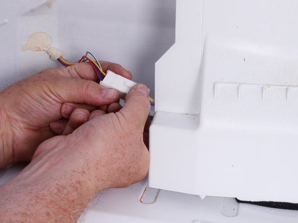 How to Test and Replace the Rear Air Duct and Damper on your LG Refrigerator Model LFX25973, Disconnect the damper motor connection: step 11, image 1 of 2