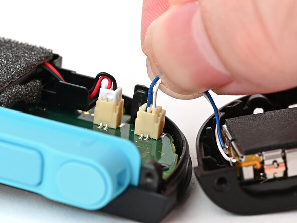 Joy-Con 2 (Left) Battery Replacement, Remove the back cover: crwdns2935265:010crwdnd2935265:01crwdnd2935265:02crwdne2935265:0