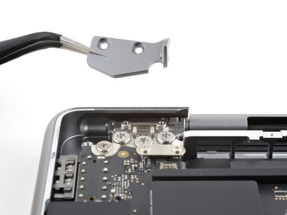MacBook Pro 14" Late 2023 (M3) Screen Replacement, Remove the hinge covers: crwdns2935265:036crwdnd2935265:03crwdnd2935265:03crwdne2935265:0
