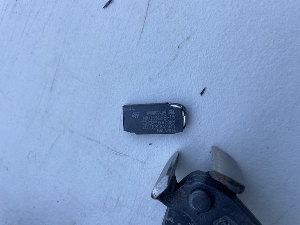 Fluke Hydra 2620A 2025A ERROR 6 caused by dead potted RTC battery - Replacement, extract cylindrical crystal from top module: step 6, image 1 of 2