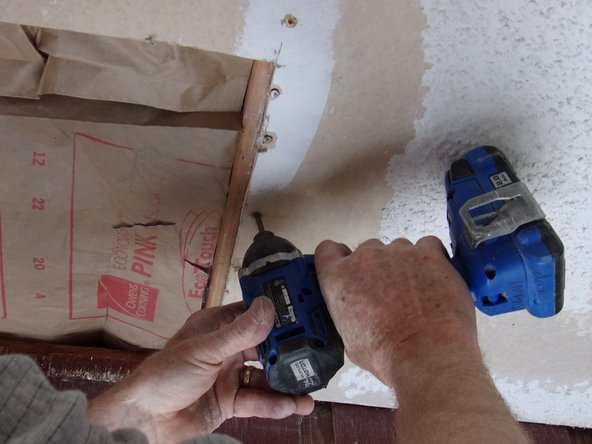 Use enough pressure when driving screws so that the screw heads imbed slightly into the wallboard surface.