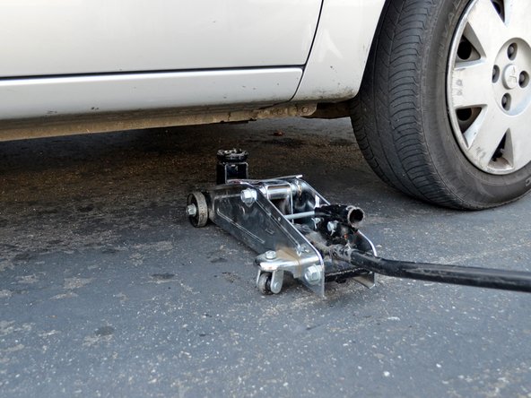 2002-2007 Mitsubishi Lancer Oil Change (2.0L I4 DOHC), Lowering the Car: crwdns2935265:010crwdnd2935265:03crwdnd2935265:03crwdne2935265:0