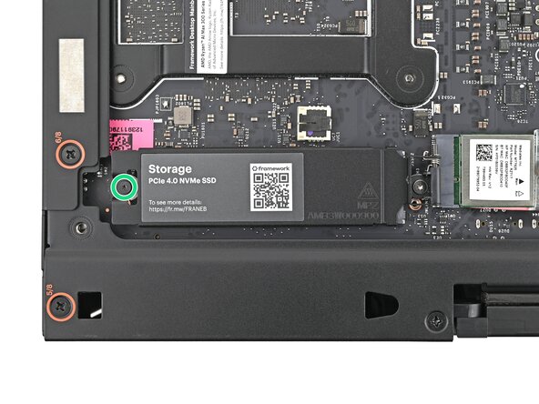 Framework Desktop DIY Edition Quick Start Guide, Loosen the secondary storage screw: crwdns2935265:024crwdnd2935265:02crwdnd2935265:03crwdne2935265:0