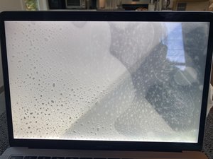 clean water marks of outside of macbook