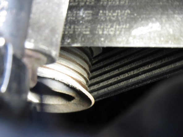 Toyota Celica GT / GTS Alternator Troubleshooting and Replacement, Installing the replacement alternator: crwdns2935265:07crwdnd2935265:02crwdnd2935265:03crwdne2935265:0