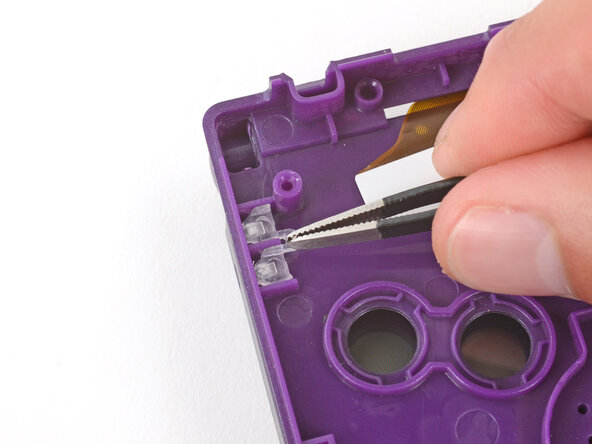 How to Reshell Your Game Boy Advance SP, Transfer the LED diffuser: crwdns2935265:051crwdnd2935265:03crwdnd2935265:03crwdne2935265:0